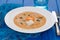 Traditional portuguese dish bread with fish acorda on dish
