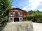 Traditional pretty building model located beside road in Basque Country