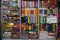 Traditional Rajasthan dress materials for sale in a cloth merchant shop in India. Colorful Jodhpur fabric street stall. Bandhej or