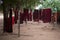 Traditional red buddhist robes hang drying