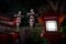 Traditional red Japanese lantern posts in Yasaka Shrine at night. Gion Temple