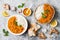 Traditional red lentil Dal. Indian Dhal spicy curry in bowl with flat bread and spices. Top view, overhead.