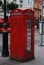 Traditional red phone both on the street of London, England. United Kingdom. Street View, Isoalted.