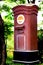 Traditional red postbox in Thailand