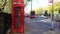 Traditional red telephone box, double decker London buses, Park Lane, Hyde Park, London, England