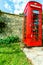 Traditional red telephone box in UK