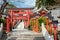 Traditional red torii gates leading to Sankou Inari Shrine at Inuyama Castle, Aichi Prefecture, Japan