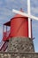 Traditional red and white windmill in Pico island, Azores. Portu