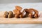 Traditional regional German green cabbage sausage variation of Oldenburger, Bremer and AmmerlÃ¤nder Pinkel on wooden cutting board