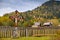 Traditional religious cross symbol with autumn scenery background in Bucovina