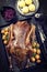 Traditional roasted stuffed Christmas duck with blue kraut and dumpling