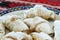 Traditional romanian dessert coltunasi cornulete dumplings with jam or turkish delight