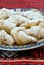 Traditional romanian dessert coltunasi cornulete dumplings with jam or turkish delight