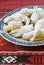 Traditional romanian dessert coltunasi cornulete dumplings with jam or turkish delight