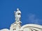 Traditional roof statue with blue sky