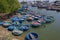 traditional round boats and other vessels on fishermen in harbour, Vietnam,