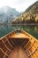 Traditional rowing boat at Lago di Braies in the Dolomites