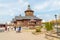 Traditional russian church with domes in a village in a sunny summer or autumn day