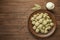 Traditional Russian dumplings with meat on a brown background. The view from the top. Copyspace.