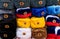 Traditional russian ushanka hats in many colors with symbols of Russia and Soviet Union in Moscow, Russia