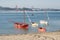 Traditional sailboats anchored on the beach. Old fish boat of Rias Baixas.