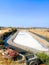 Traditional saltworks. Isla Cristina, Huelva, Spain. Deposits sediments, canals and mud flats. Southern Andalusia saltworks