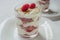 Traditional Scottish Cranachan desserts with toasted oats, fresh raspberries, cream and whisky