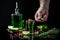 Traditional set for drinking Absinthe. Alcohol, luxurious spirits and dangerous liquor absinthe. green bottle of strong spirit
