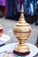 Traditional set of steamed rice container for Buddhist monks going on daily alms round in morning at Mon Bridge, Sangkhlaburi,