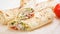 Traditional shawarma with chicken. Roll in a wheat tortilla with vegetables, salad and chicken. Turkish cuisine. Food banner