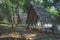 Traditional shelter with thatched roof in the middle of bamboo forest at Hutan Bambu Wanadesa, Balikpapan