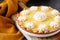 Traditional shortcrust pastry lemon tart with citrus custard and