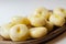 Traditional Silesian dumplings with a hole,  homemade noodles served with butter