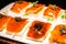 Traditional sliced peking roasted duck skin served with caviar on top