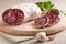 Traditional sliced salami with garlic and herbs