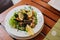 Traditional slovenian cuisine, seafood salad with fresh mussels, selective focus