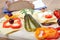 Traditional south german light meal on wooden board, german bread with cheese and vegetables