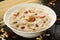 traditional South Indian sweet pudding Kheer in a white bowl