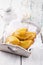 Traditional Spanish baked empanada de carne with chicken and vegetable in a wooden tray