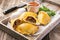 Traditional Spanish baked empanada de carne with minced meat and vegetable on a design tray