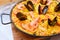 Traditional spanish dish paella with prawns and mussels