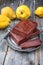 Traditional Spanish dulce de membrillo as fruit bread with quince on a pewter plate