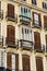 Traditional Spanish Shuttered Windows in Elegant Residential Building