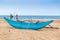 Traditional Sri Lankan fishing boat on sandy Hikkaduwa beach