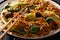 Traditional stir fry of udon noodles with bok choy, shiitake mushrooms, sesame and pepper close-up on a plate. horizontal