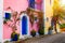 Traditional street with greek houses with flowers in Assos, Kefalonia island. Traditional colorful greek houses in Assos village.