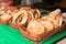 Traditional street tasty pastries on plates.