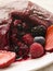 Traditional Summer Pudding with a scoop out