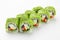 Traditional sushi roll with smoked eel, avocado and red caviar close up on a white background