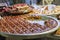 Traditional sweet Middle Eastern dessert, large dish with portioned slices of baklava